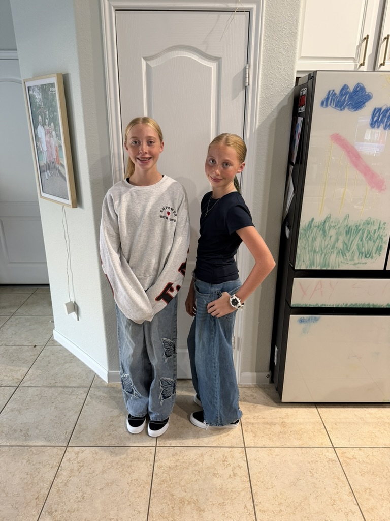 Two of the girls by the kitchen door