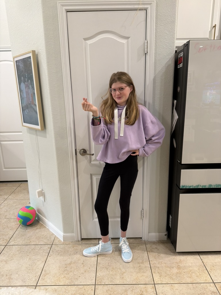 Striking a pose in the kitchen